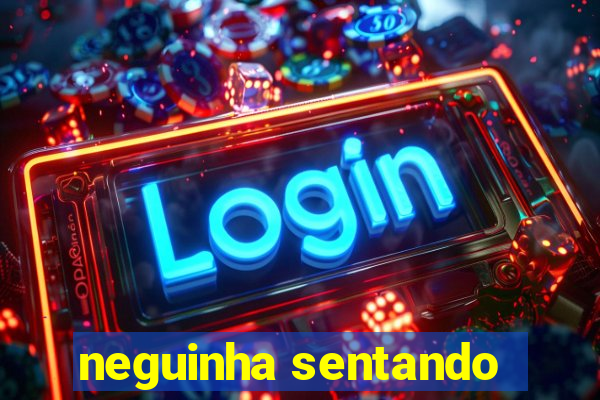 neguinha sentando
